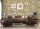 Design ID Wallstitch vlies, vinyl anyagú beige, zöld, narancssárga színű madaras, leveles modern tapéta